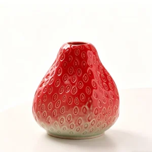 front view of strawberry-shaped ceramic vase