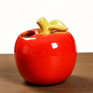 front view of apple-shaped ceramic vase