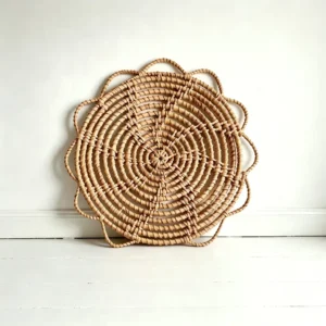 front view of layered petal rattan wall decor